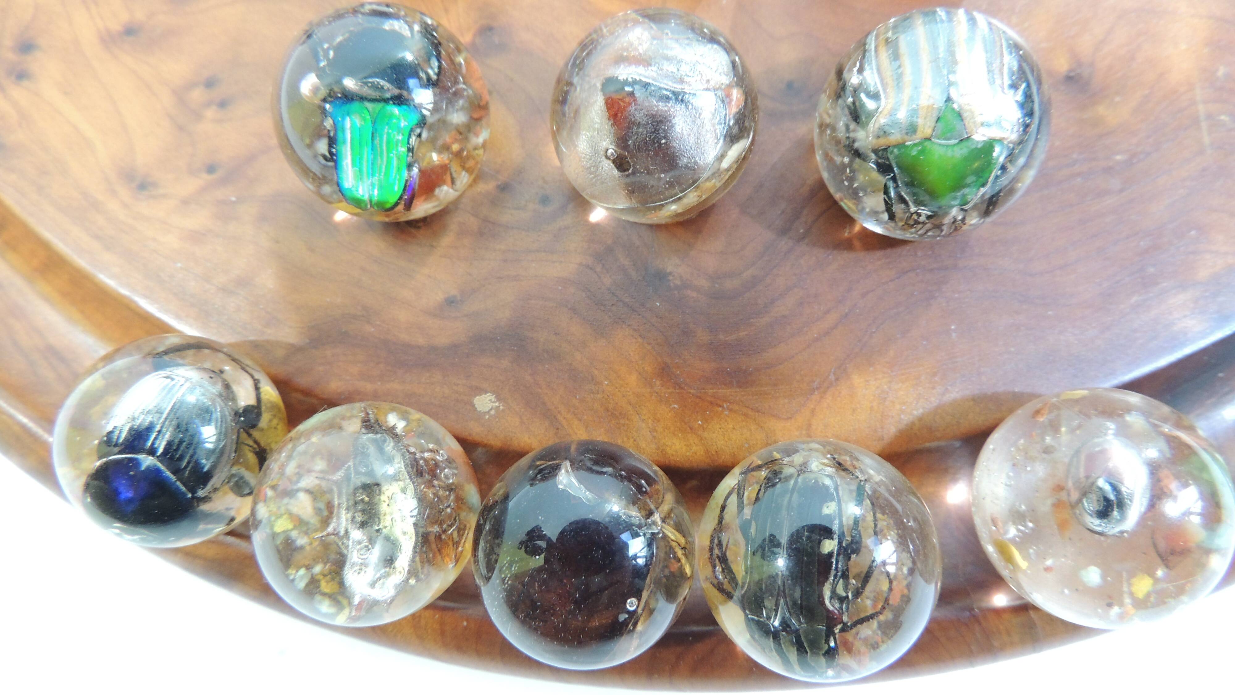 Vintage wooden solitaire game with resin balls and insects – Madaga