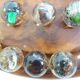 Vintage wooden solitaire game with resin balls and insects – Madaga