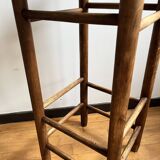 Low wooden and straw stool