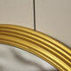 Miroir vintage rond  bordure acier doré