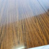 Extendable table in laminate