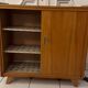 Vintage shoe cabinet with compass legs