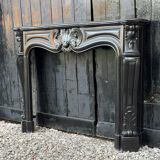 Louis XV style fireplace in black Belgian marble, circa 1880.