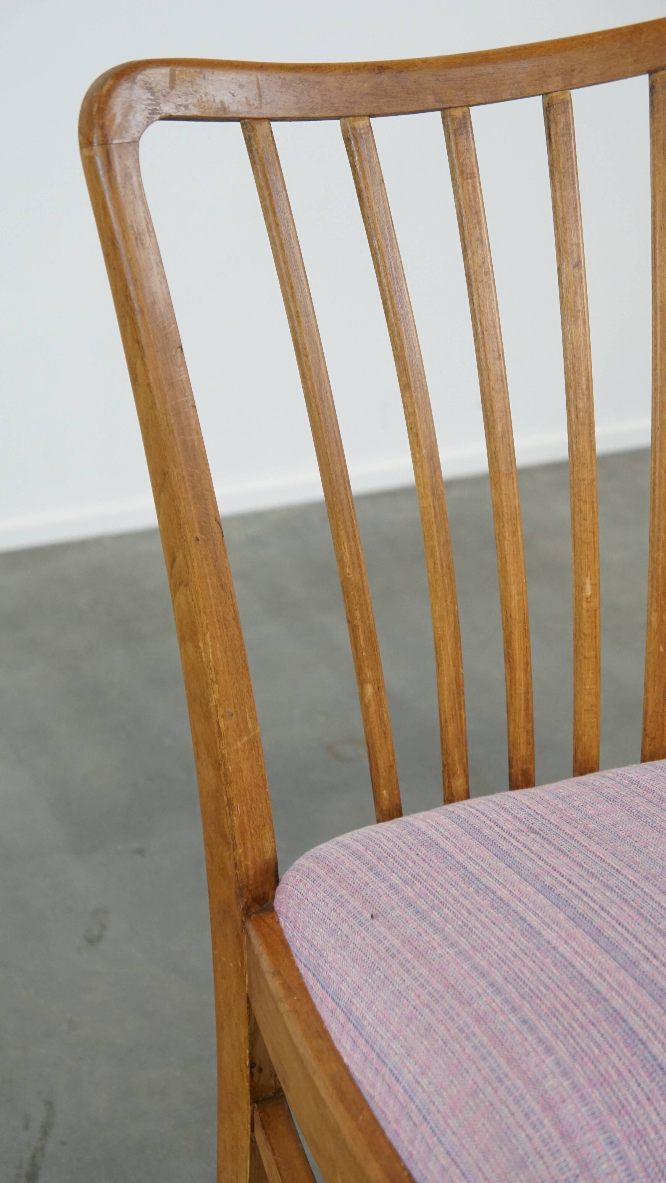 Set of 2 vintage dining chairs from the 1970s with spindle backrest and fabric seat