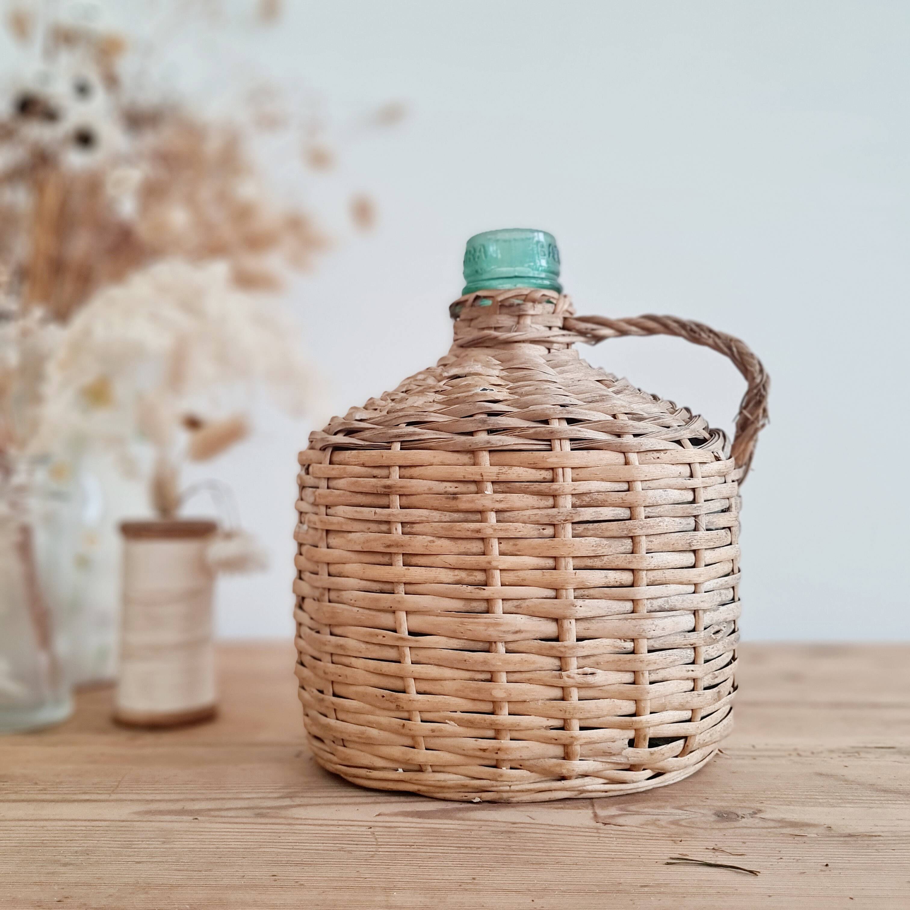Glass and rattan demijohn carboy