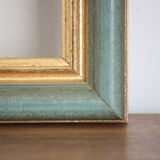 Frame in gilded and green wood