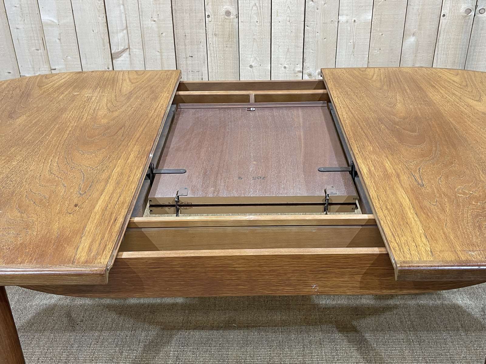 Oval table from the 70s of the G-plan brand with a butterfly extension