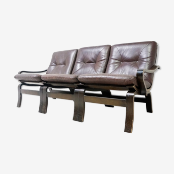 Scandinavian couch in leather and natural wood
