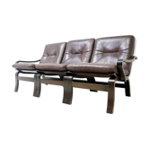 Scandinavian couch in leather and natural wood