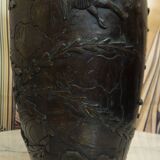 Patinated bronze vase with relief decoration