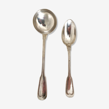 Ladle and silver metal spoon