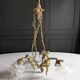 Vintage chandelier with cherubs and frosted glass flowers.
