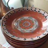 Terracotta service decorated with psychedelic drips