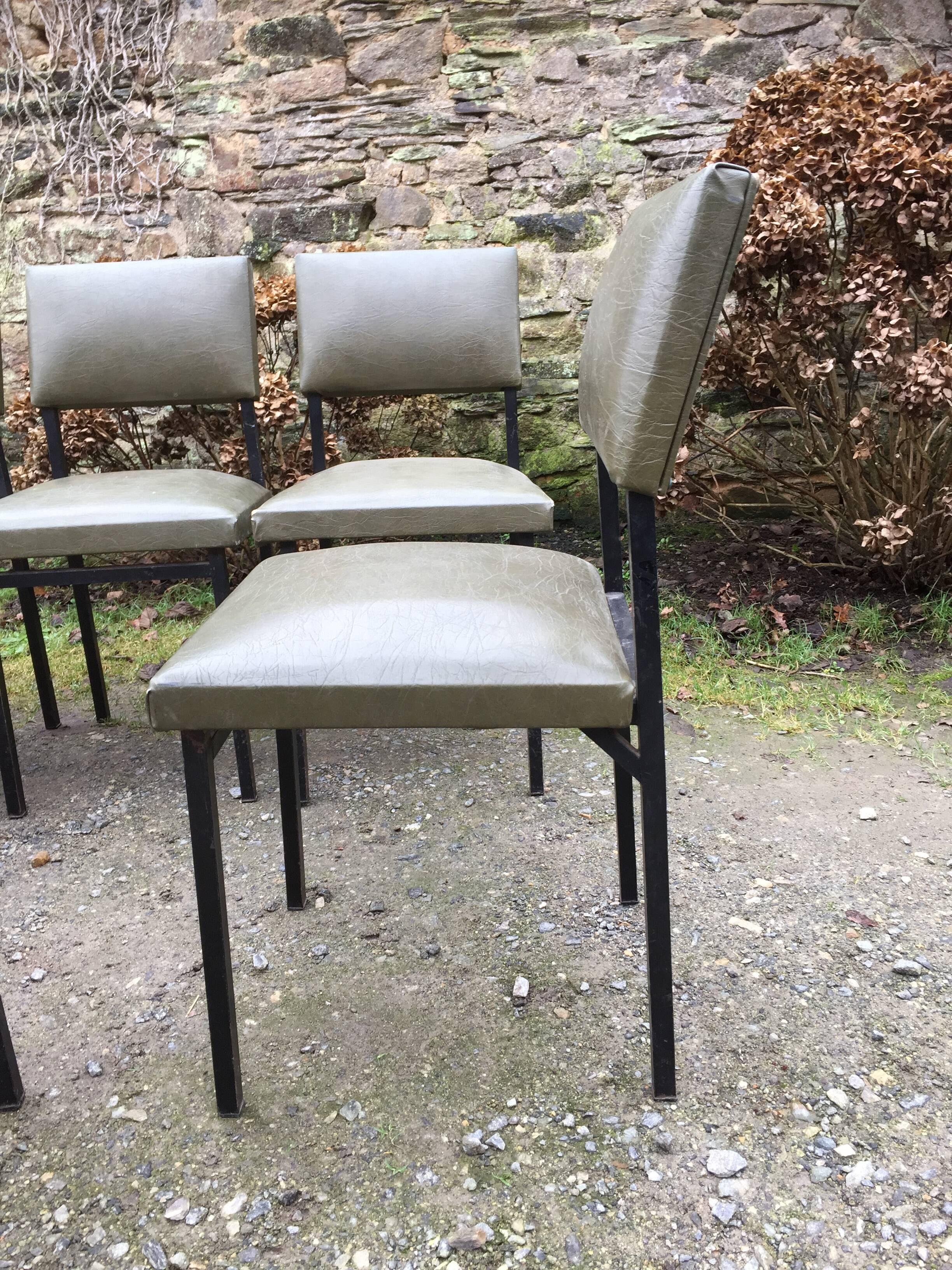 Vintage chairs guariche stone in Skaï green bottle and base in metal square tube.