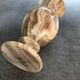 Vintage vase in marbled onyx stone shades of beige and brown