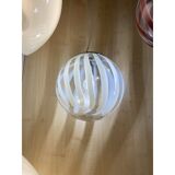 Contemporary transparent and white sphere pendant in murano glass