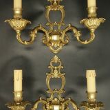 Pair of large Baroque / Rococo / Louis XV style wall lights - gilded bronze