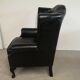 Fauteuil bergère chesterfield cuir noir