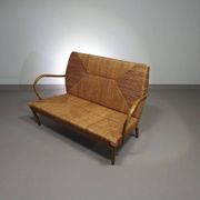 Vintage French papercord sofa with a metal frame base