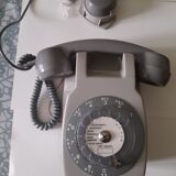 Wall telephone with dial with amplifier