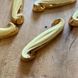 Set of 12 vintage art deco yellow and gold ceramic knife rests