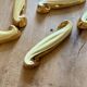 Set of 12 vintage art deco yellow and gold ceramic knife rests