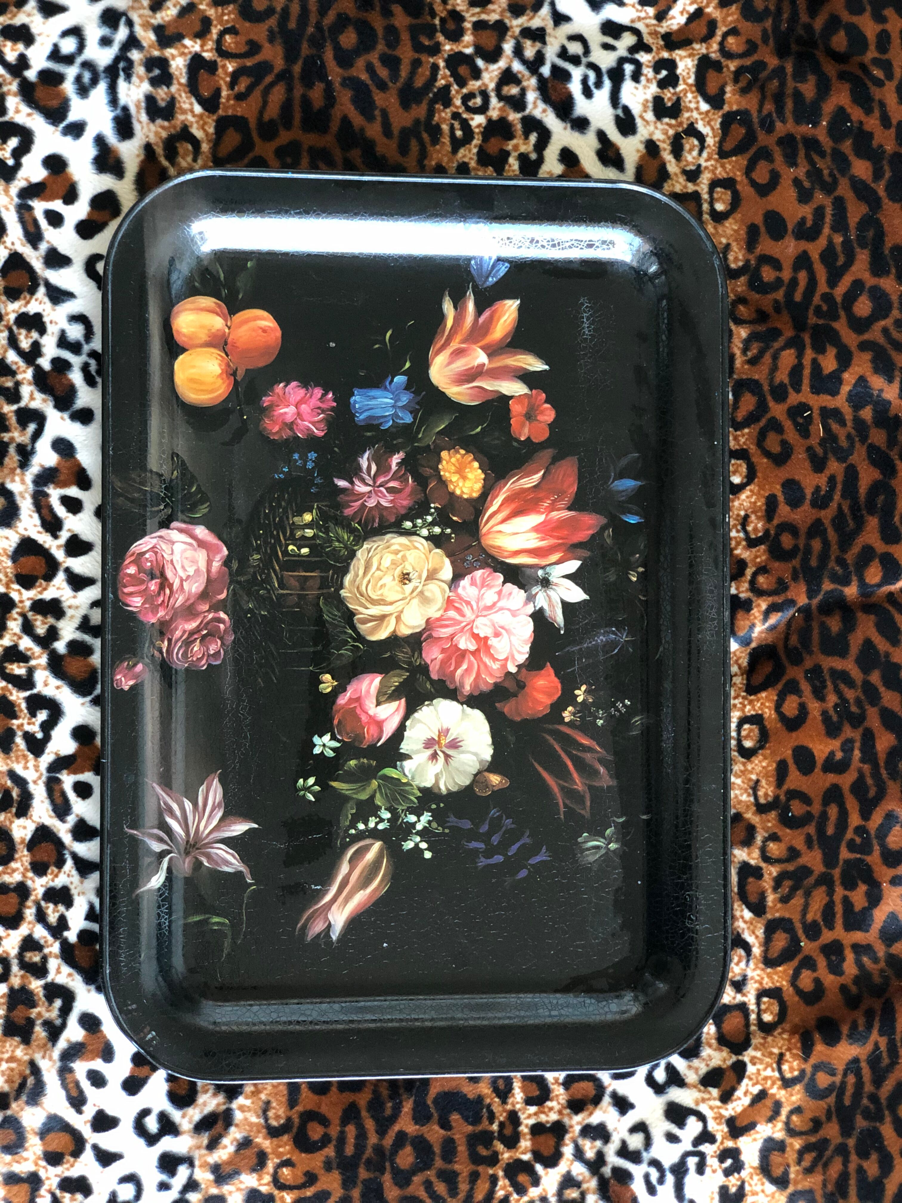 Black tray with floral motifs