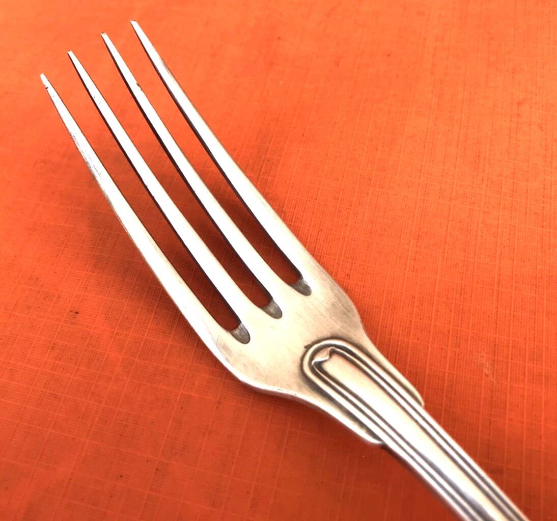 Antique dessert fork by silversmith Christofle, Chinon model collection.