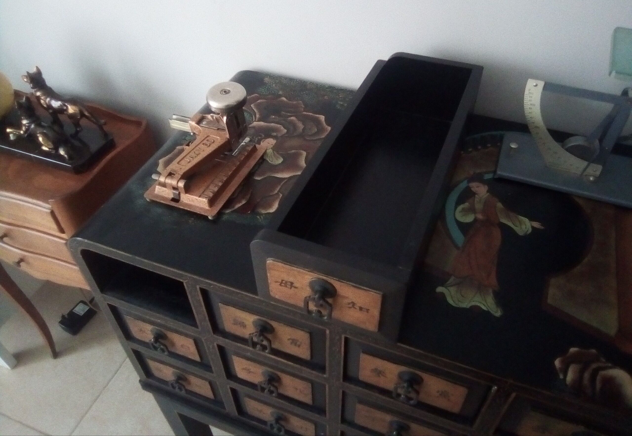 Furniture with an ancient Asian apothecary drawer