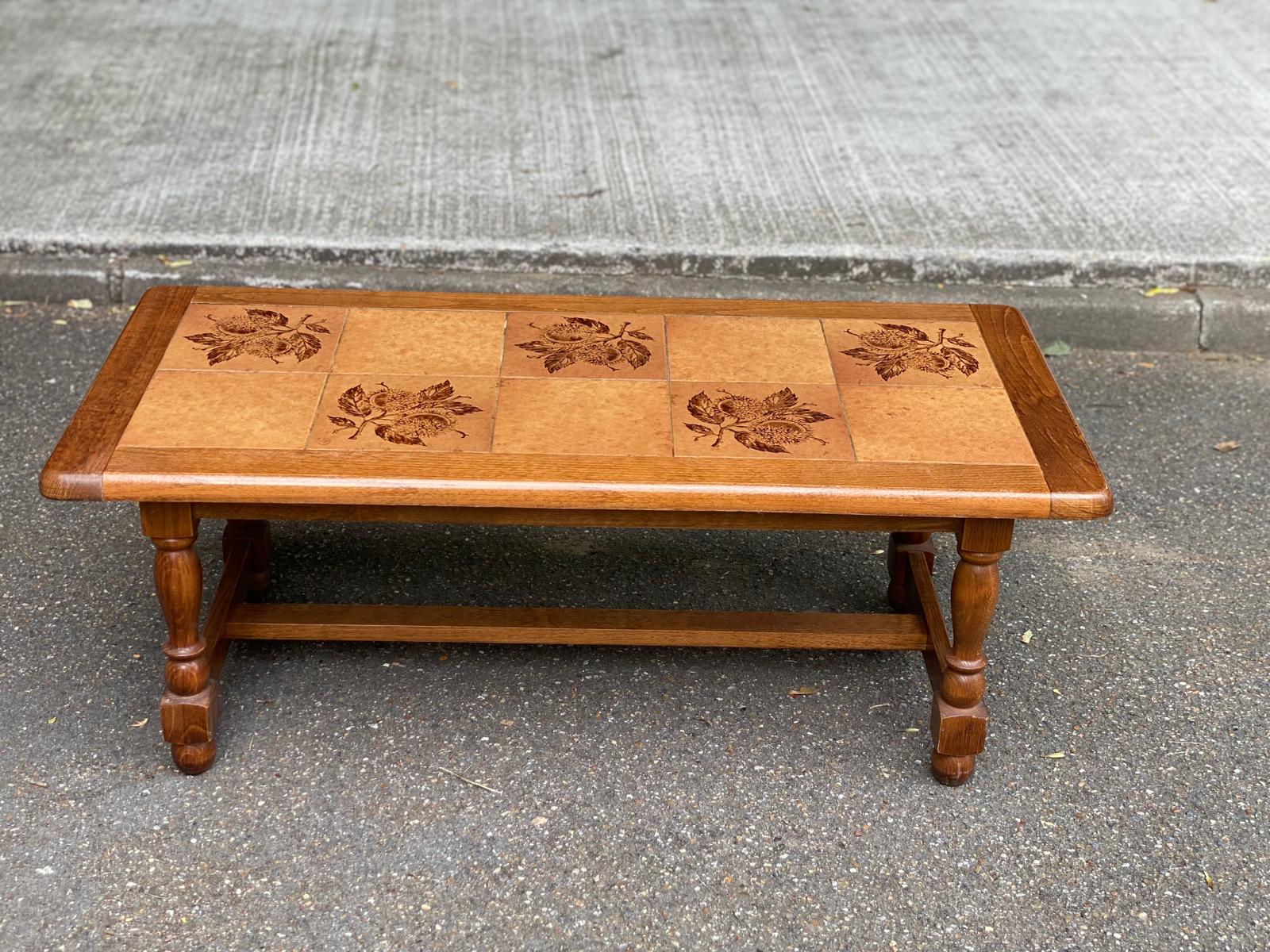 Solid wood and ceramic coffee table from the 1970s.