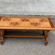 Solid wood and ceramic coffee table from the 1970s.