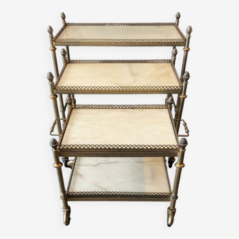 Neoclassical nesting trolleys in gilded brass and peach marble 1950/1960.