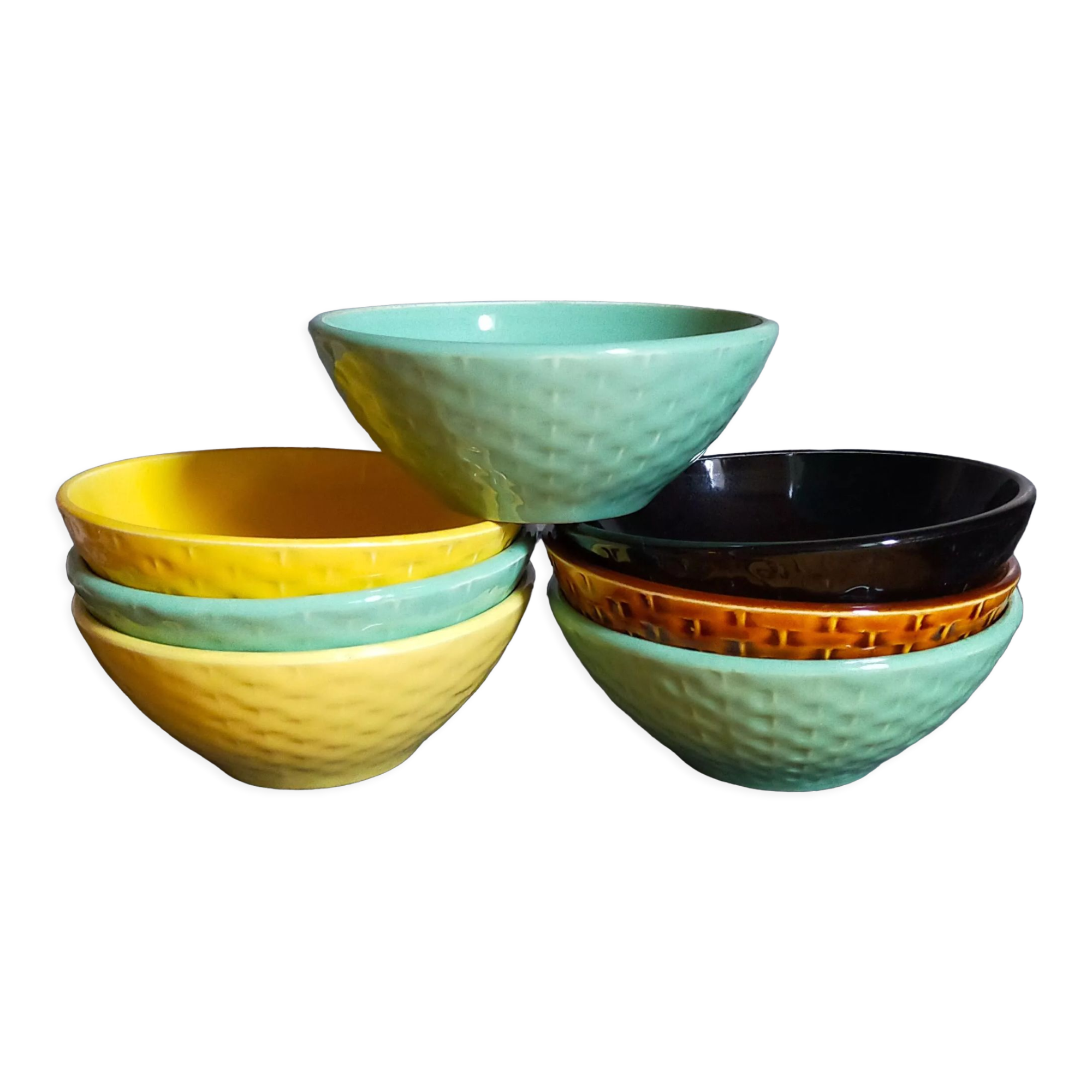 Seven vintage slip ceramic bowls