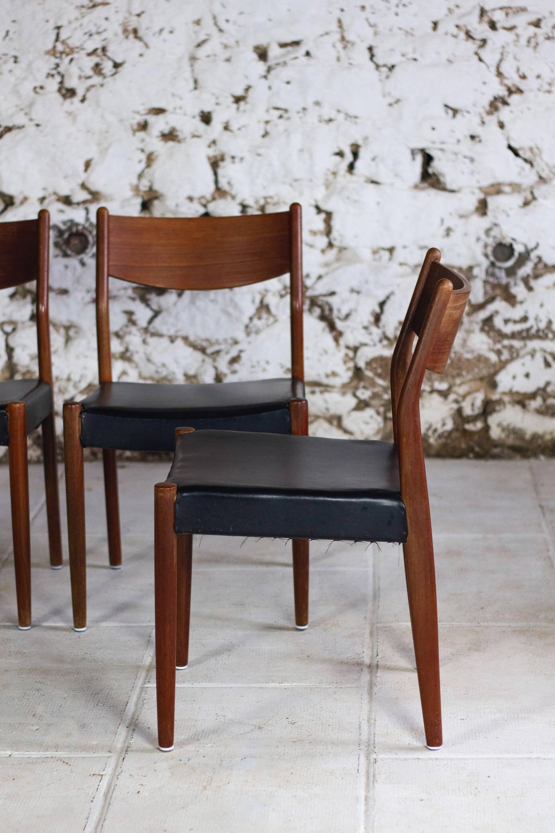 4 Scandinavian Fristho Franeker chairs in teak and faux leather, 1960.