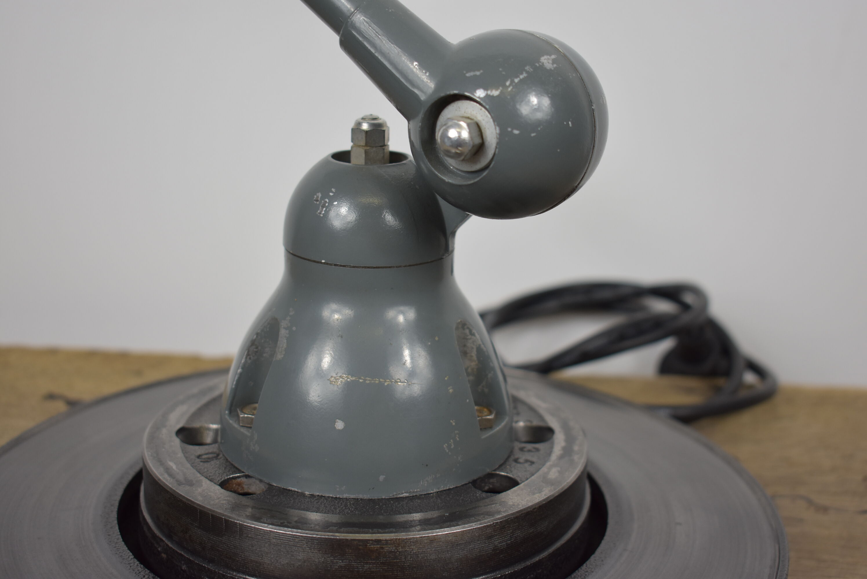 Jielde lamp on industrial metal base