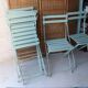 6 antique folding garden chairs made of painted wood and metal.