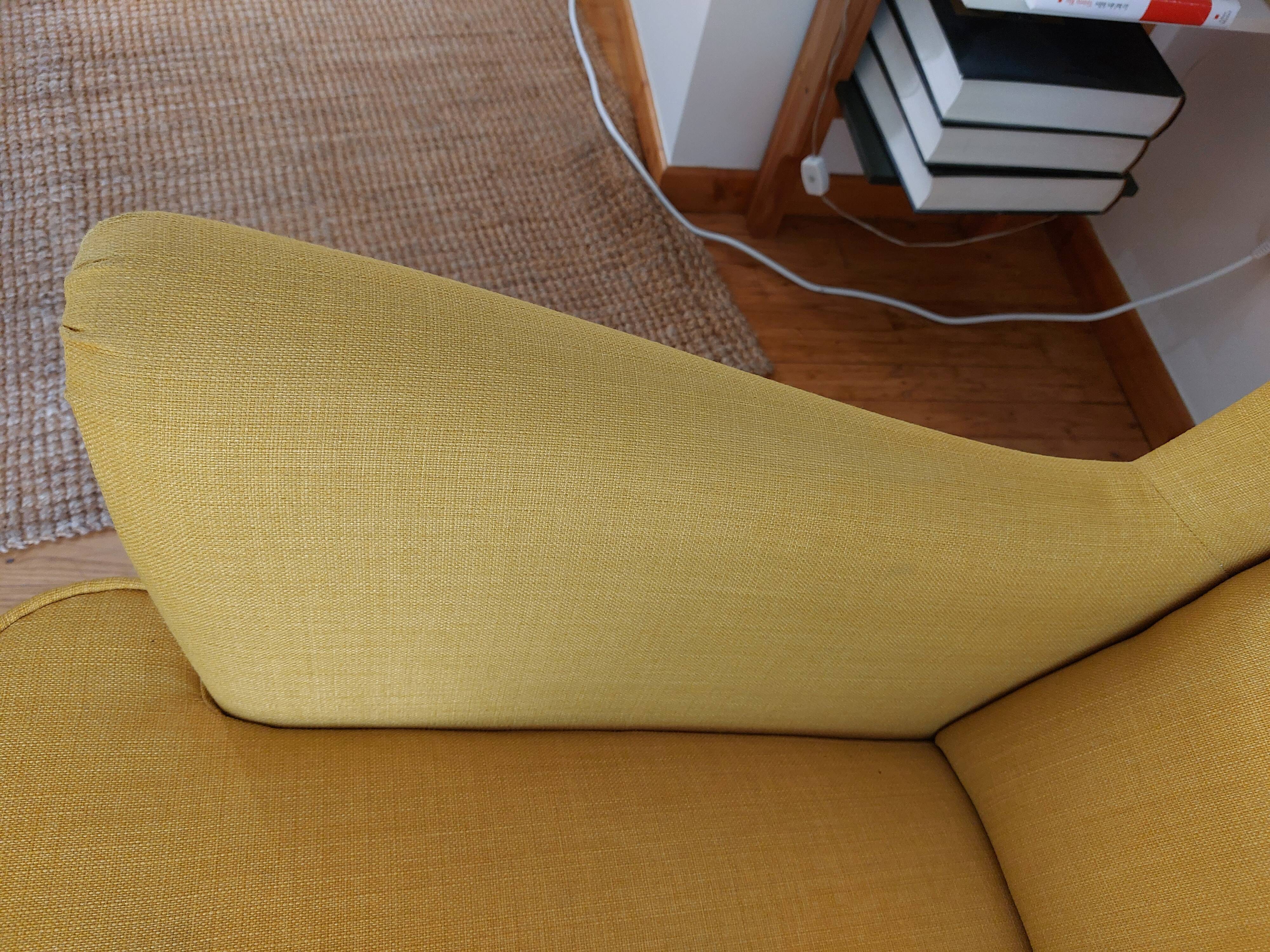 Yellow-eared armchair and its footrest