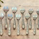 12 oyster forks with crossed ribbons in silver metal