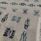 White and blue rug with Berber patterns, hand-woven in natural wool