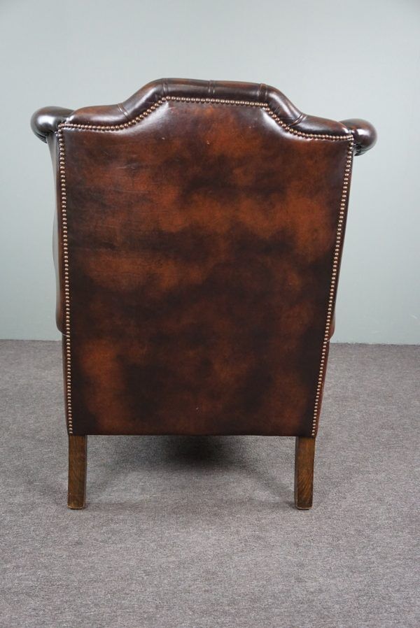 Chesterfield armchair with armrests
