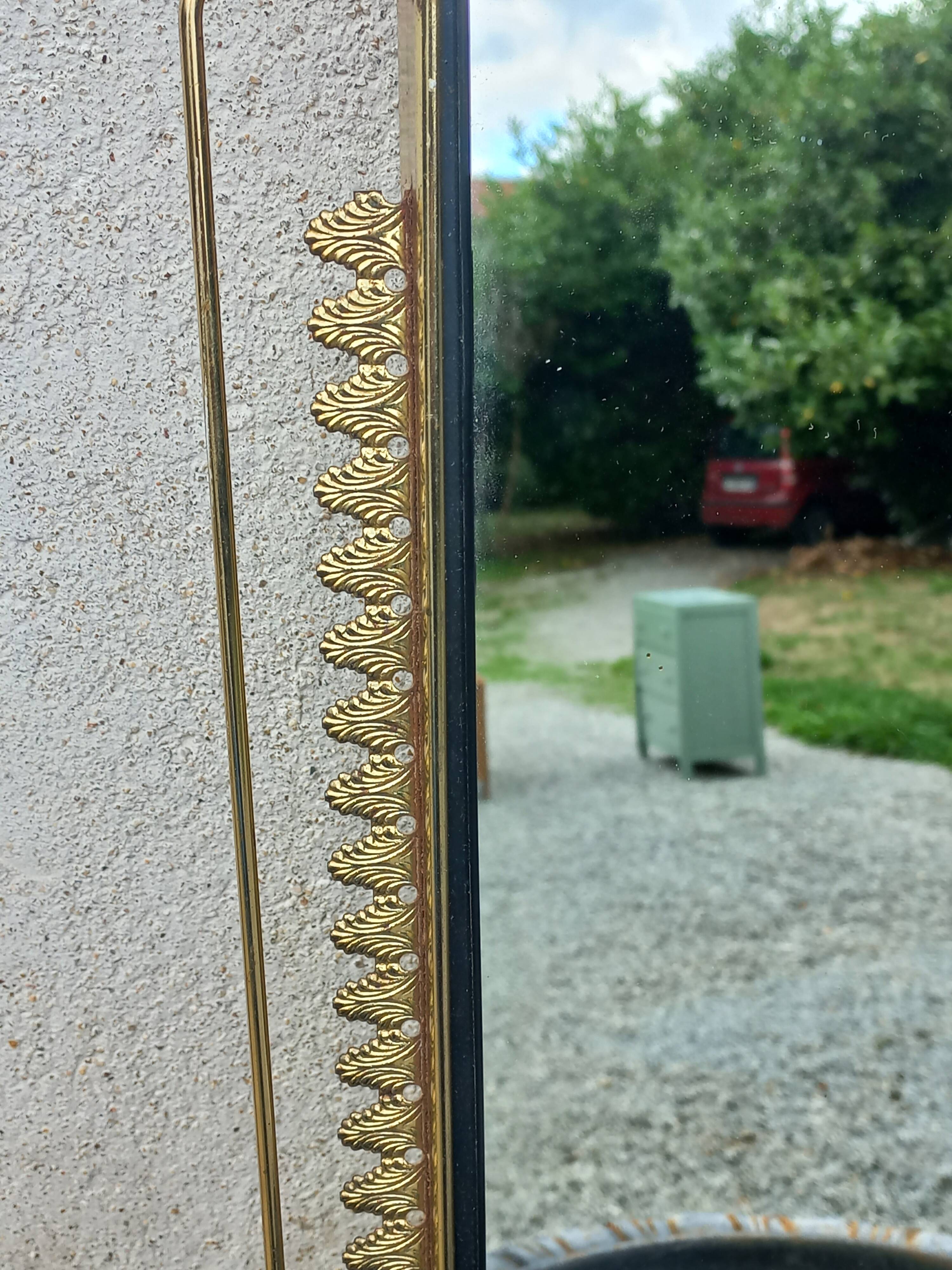 Vintage 1950s neoclassical style gold metal mirror