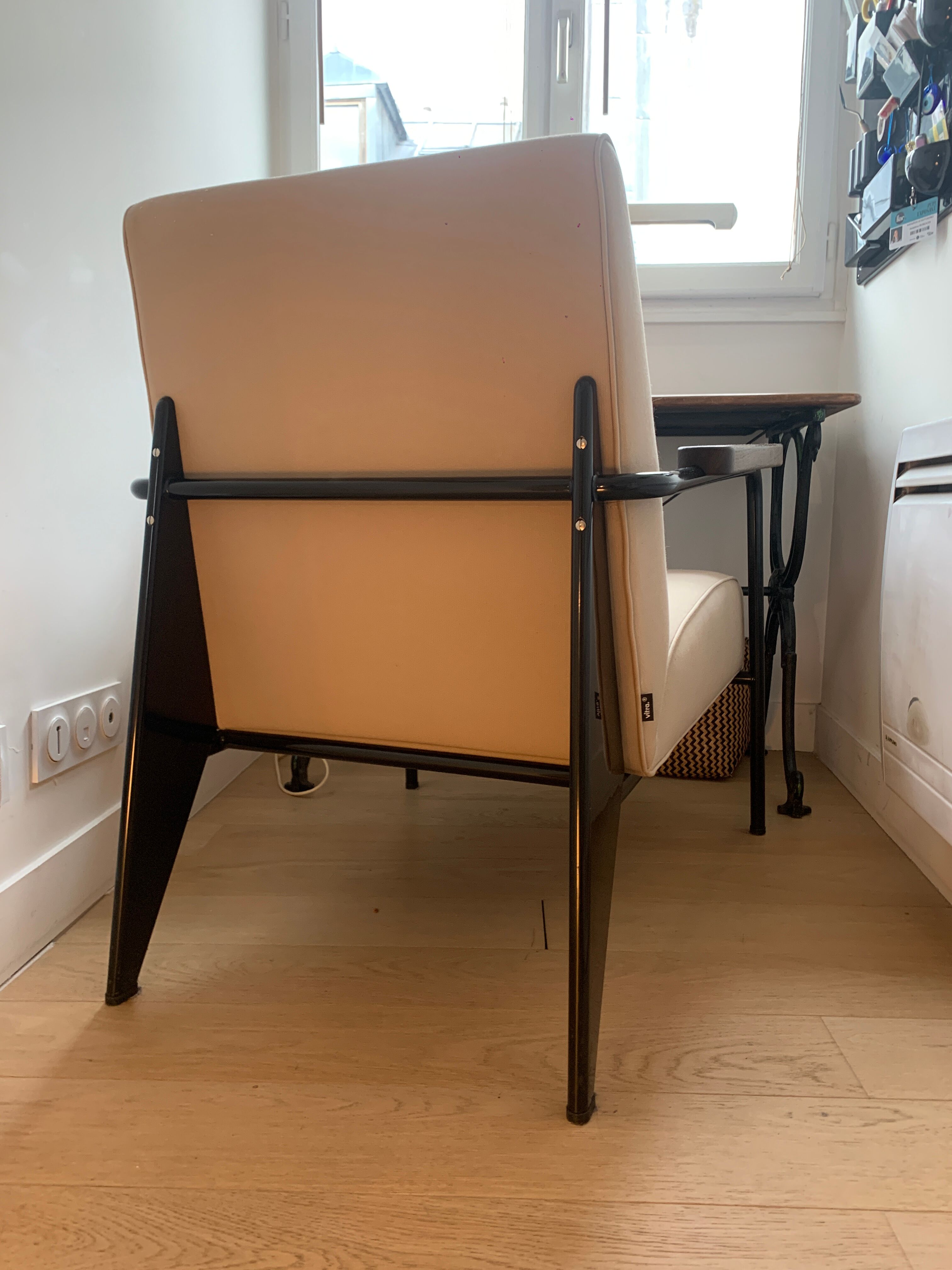 Lounge armchair by Jean Pouvé edited by Vitra