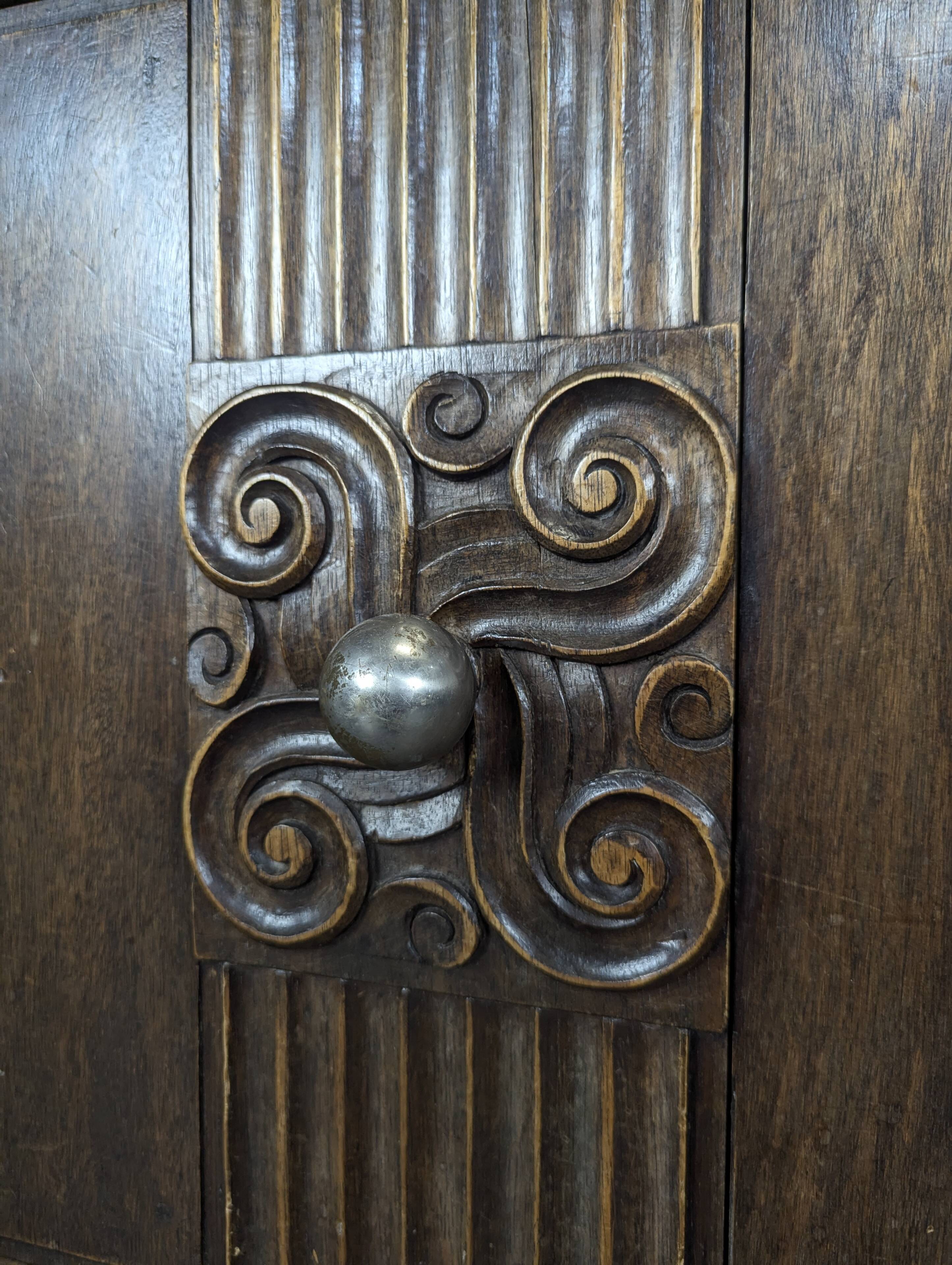 Art Deco oak enfilade with a diamond point decoration.