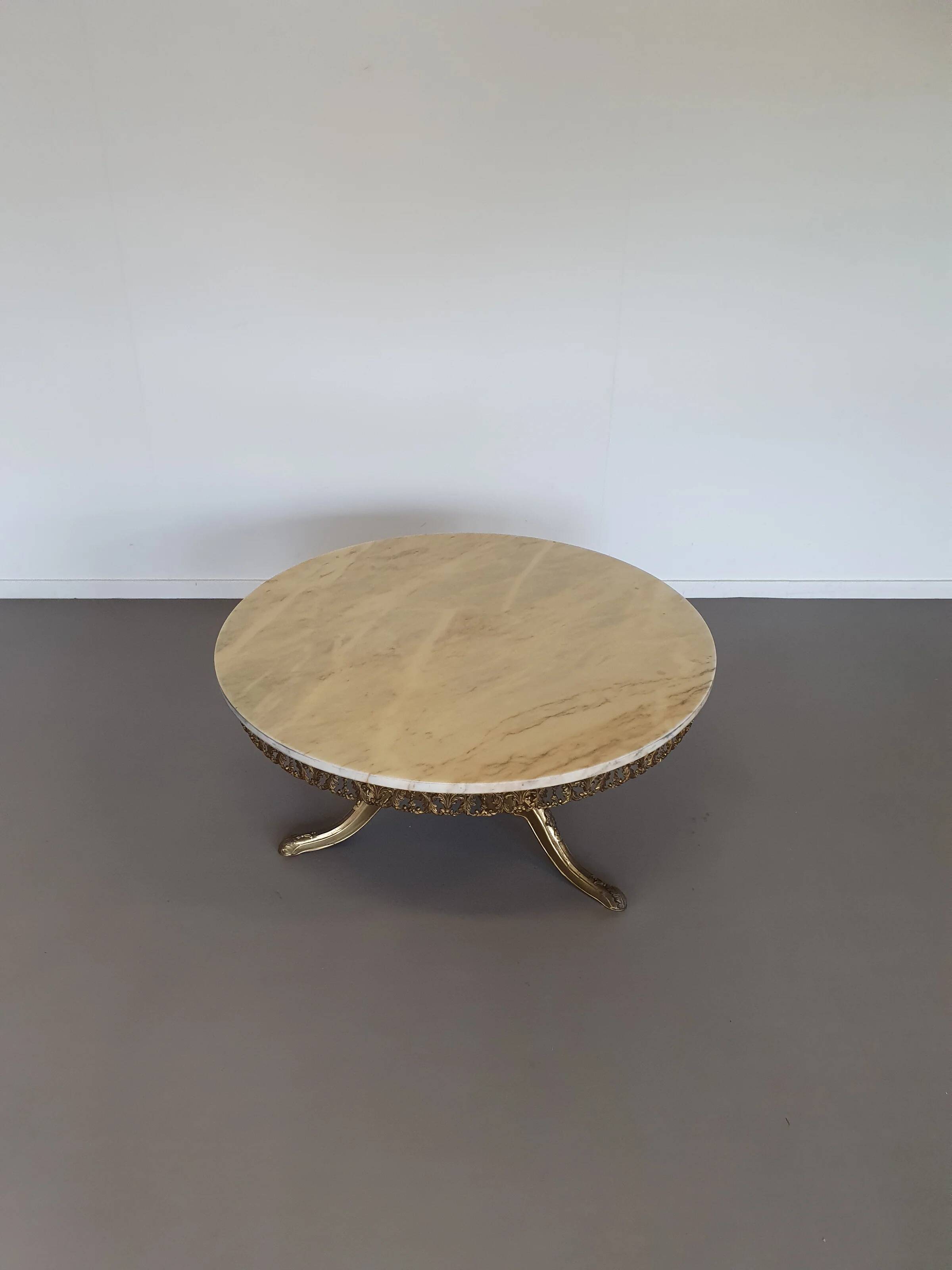 1960s marble coffee table. Marble top / fire-gilded base with many details