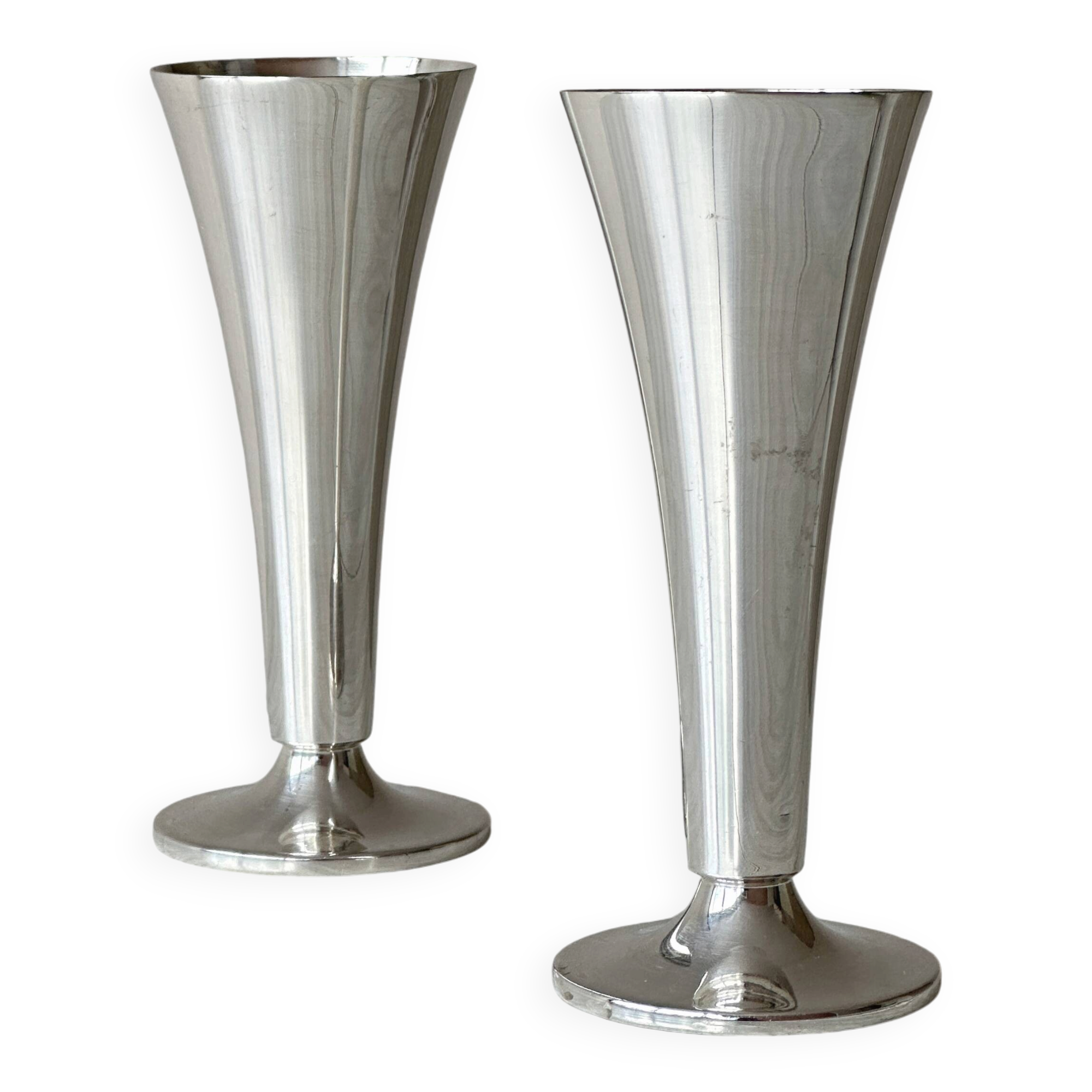Two silver-coloured lightweight metal flower vases.