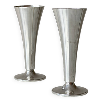Two silver-coloured lightweight metal flower vases.