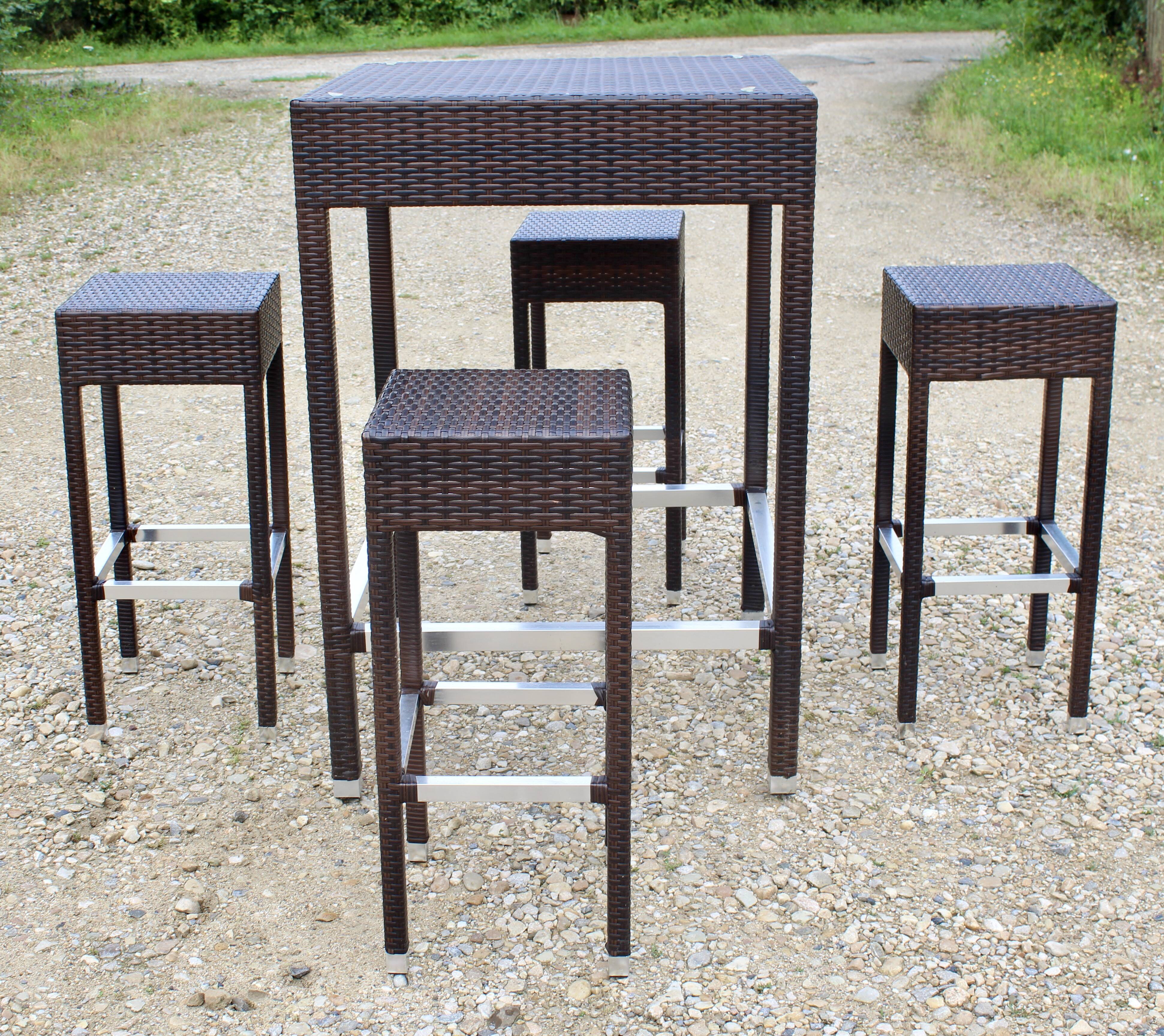 Garden furniture a standing table and 4 stools
