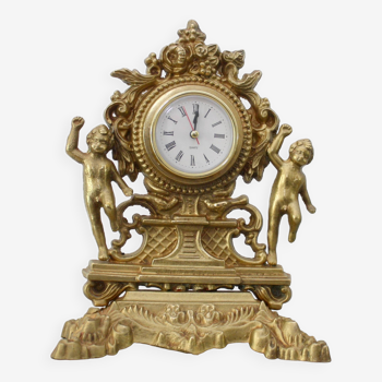 Horloge en bronze dore cherubin angelot rococo