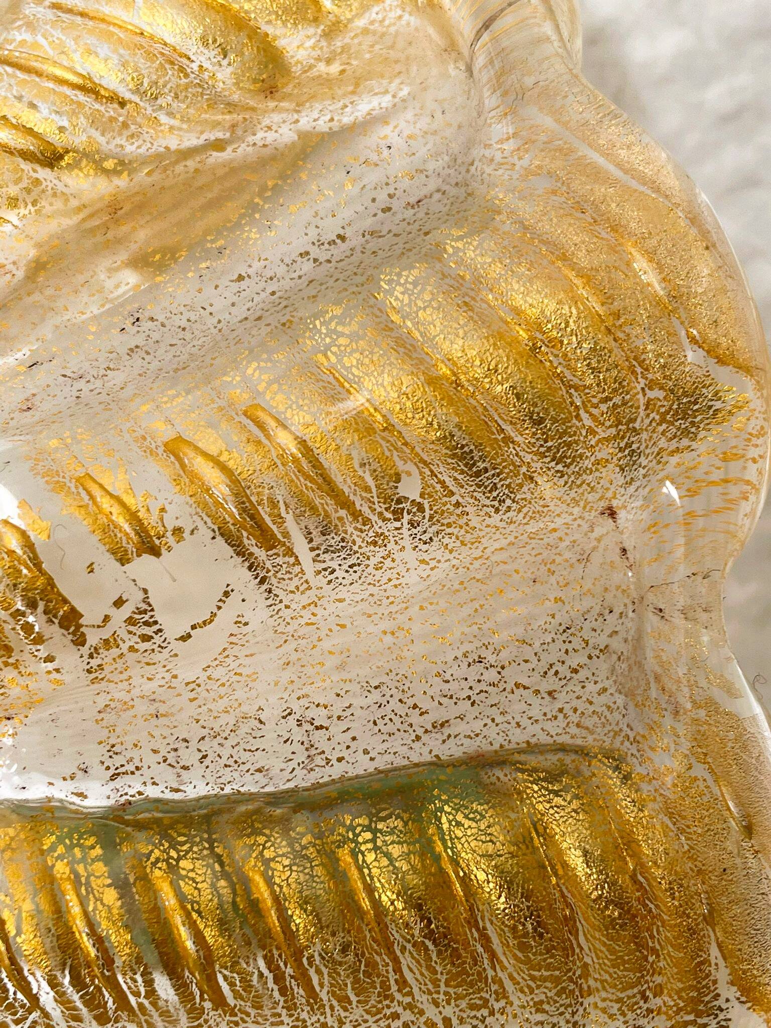 Murano glass scallop bowl in Italy with gold glitter trim