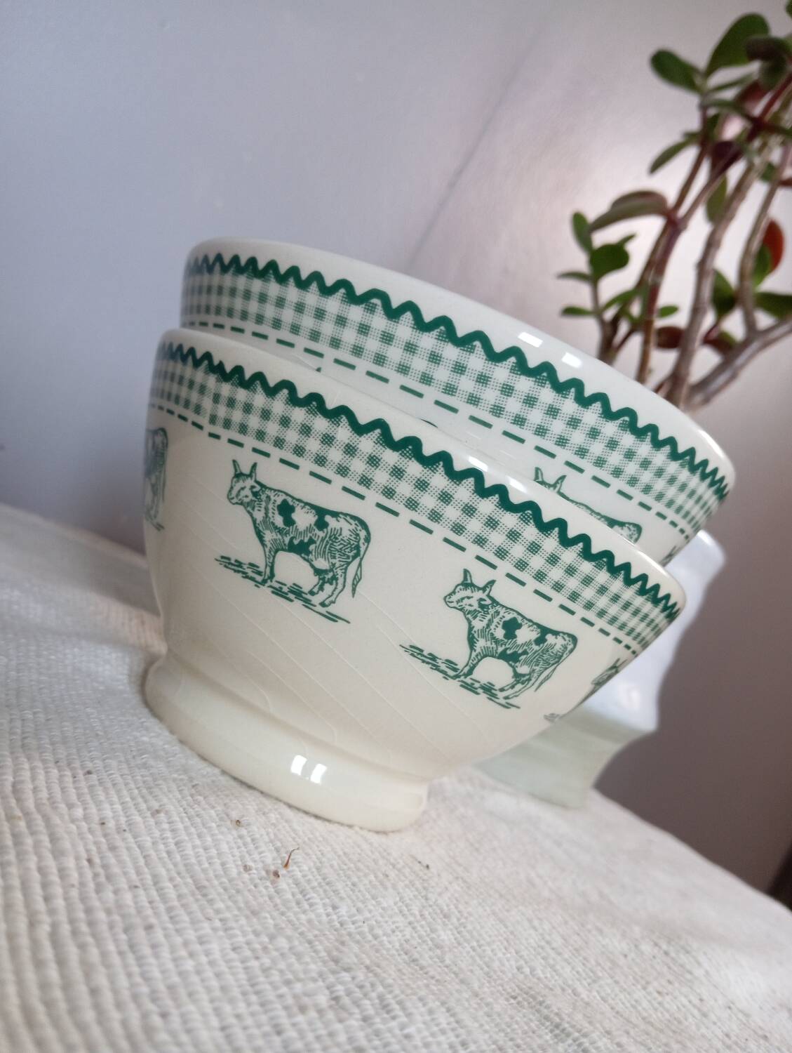 Duo of “daisy” cow decor bowls by Geneviève Lethu, 1996